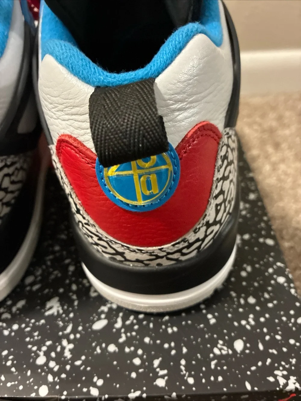 Jordan Men's White Athletic Shoes with Black, Red & Blue Accents
